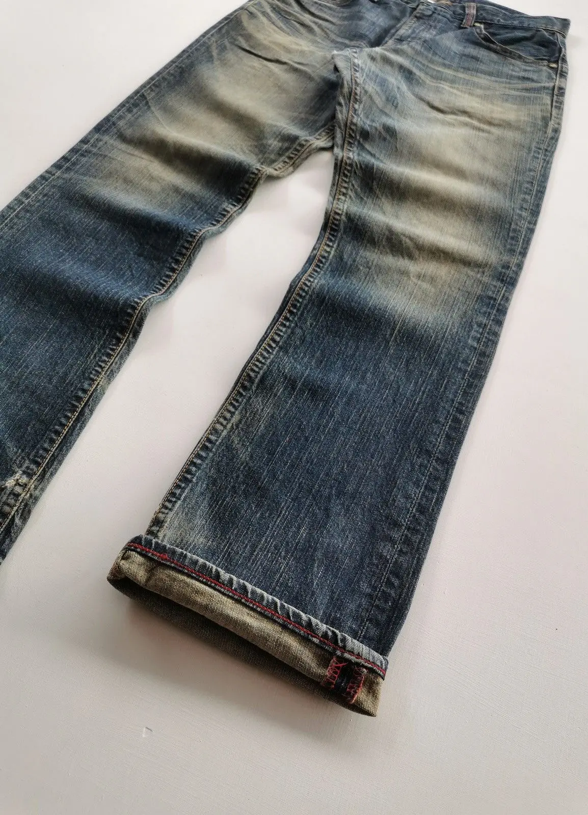 Edwin distressed denim mudwash design