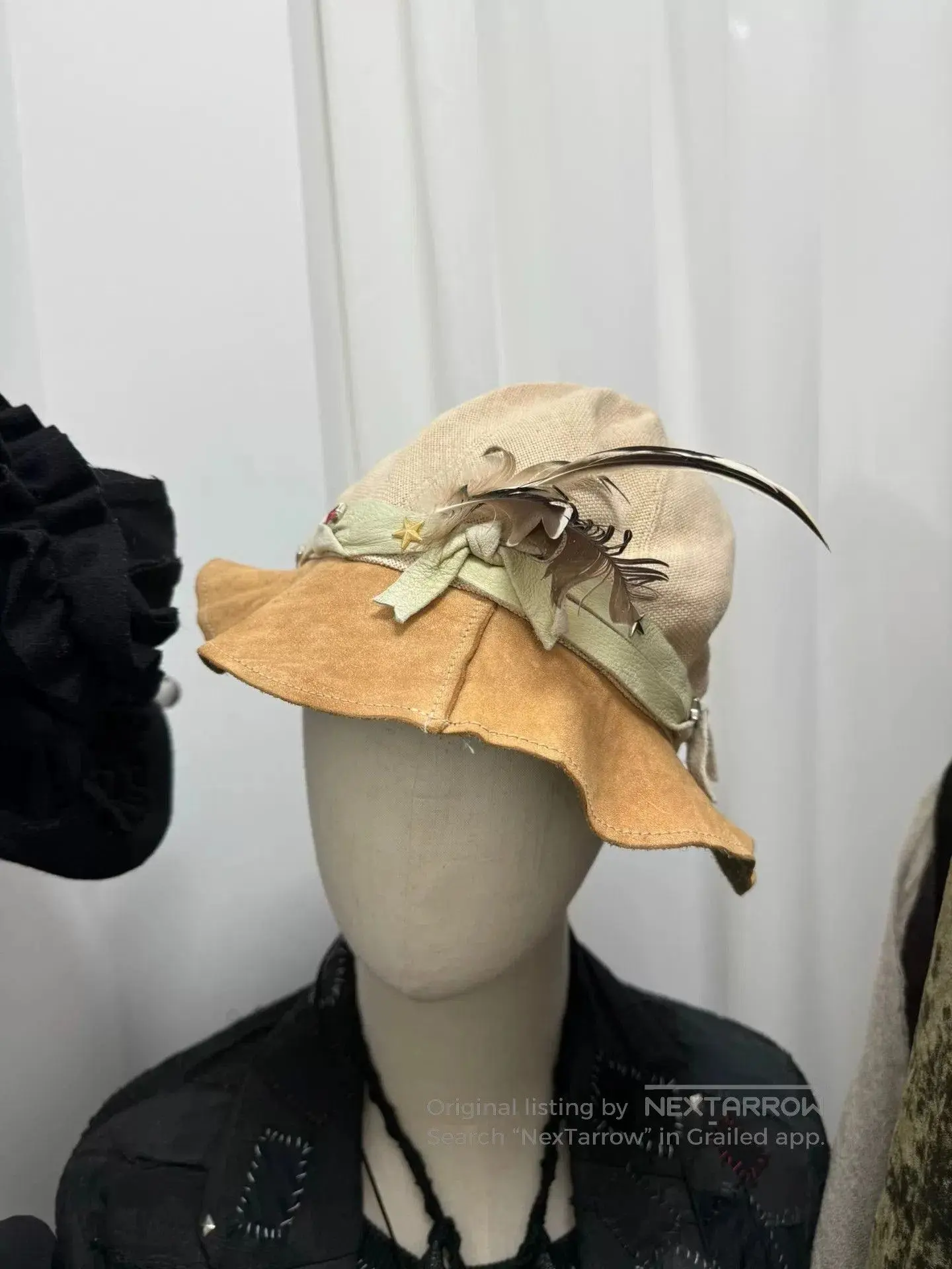 soloist feathered fishermans hat.