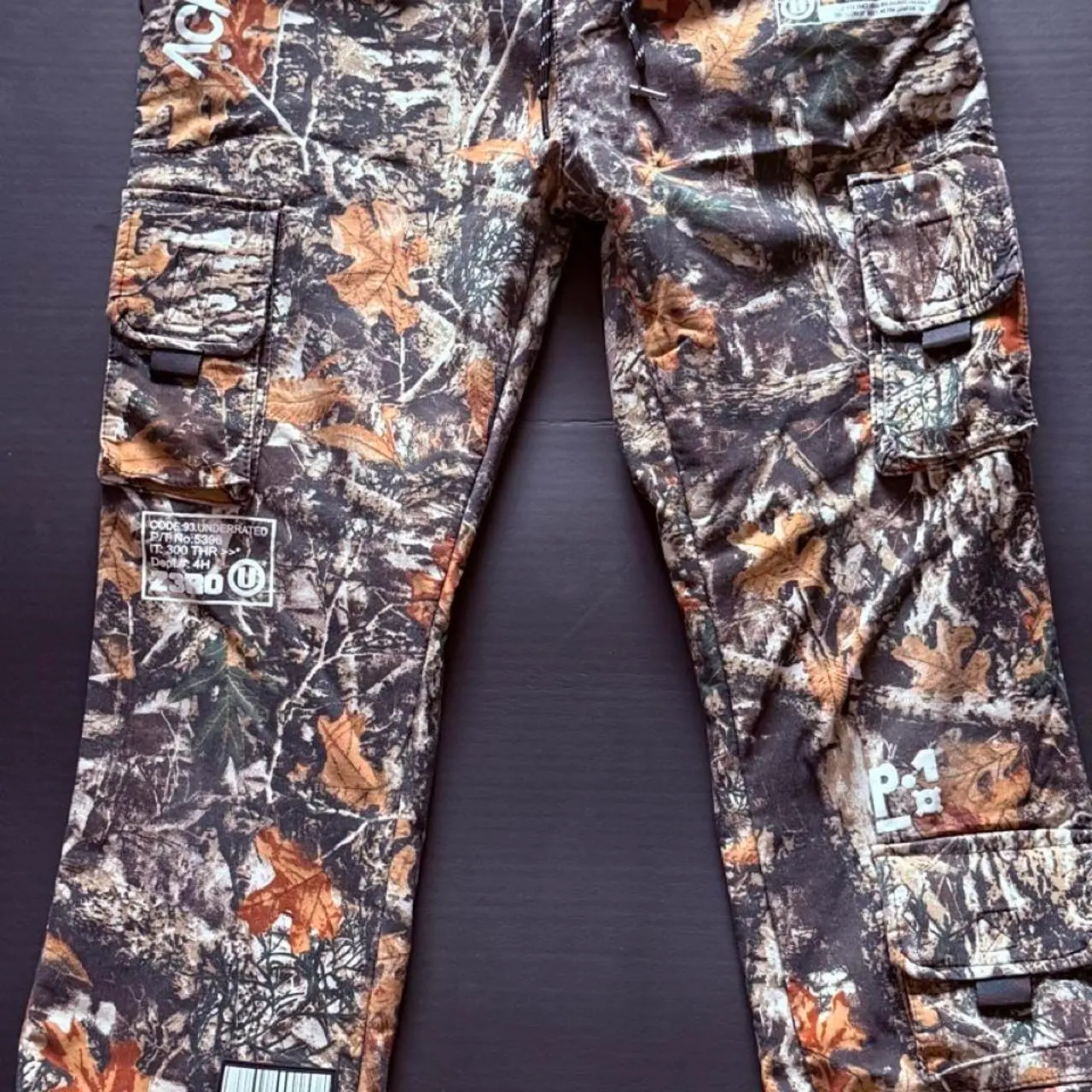 ACRONYM camo cargo pants with leaf and branch print #cargo #military
